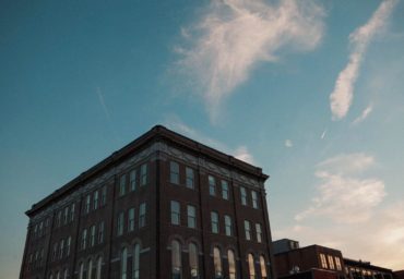 True Reforming building at sunset