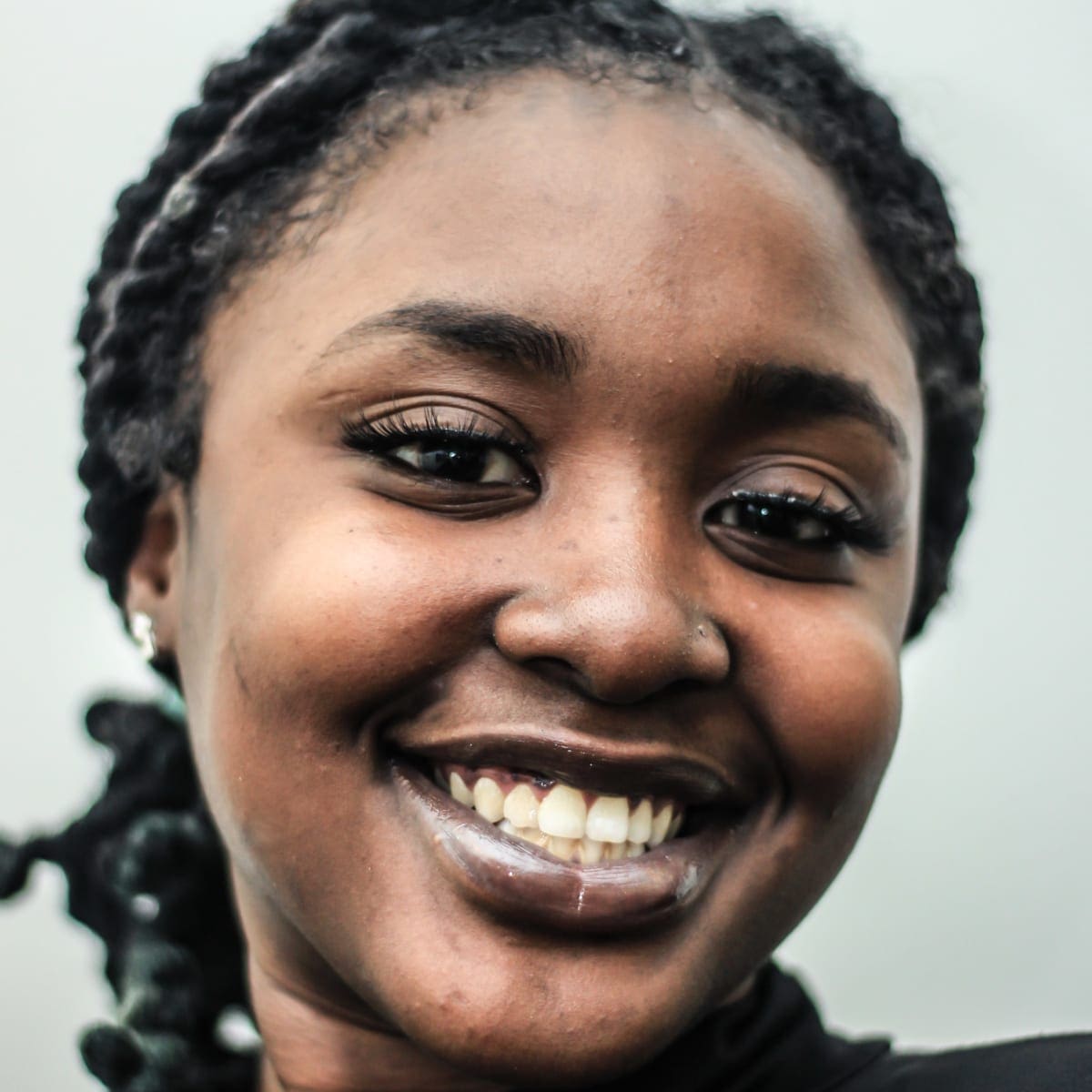 Woman smiling in focus