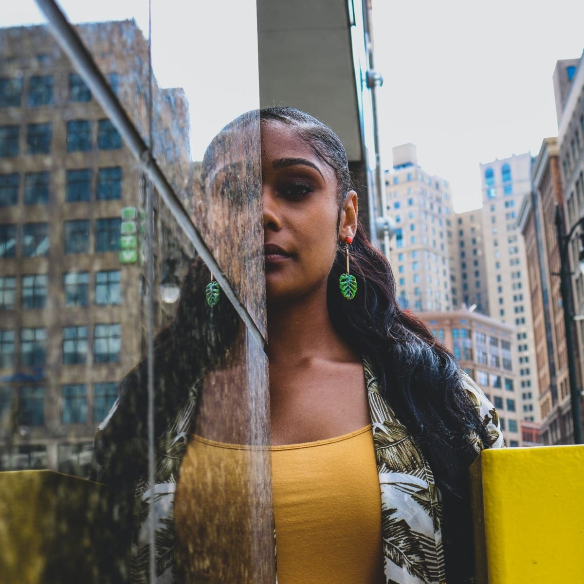 Woman standing in front of wall